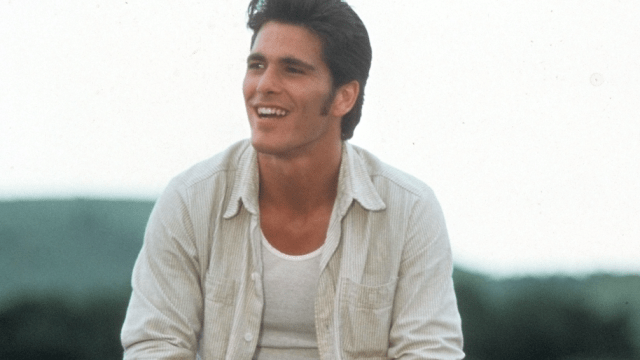 Michael Schoeffling smiling movie still