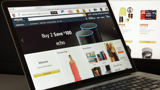 Milan, Italy - August 10, 2017: Amazon website homepage. It is an American electronic commerce and cloud computing company. Amazon.com logo visible.