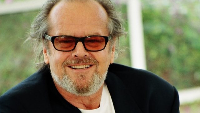 CANNES, FRANCE - MAY 22: Jack Nicholson shouts as he poses for photographers during the photocall for film 'About Schmidt' 22 May 2002 during the 55th Cannes film festival, France