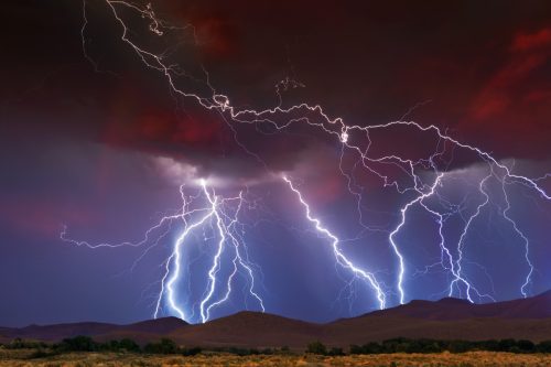 lightning striking hills