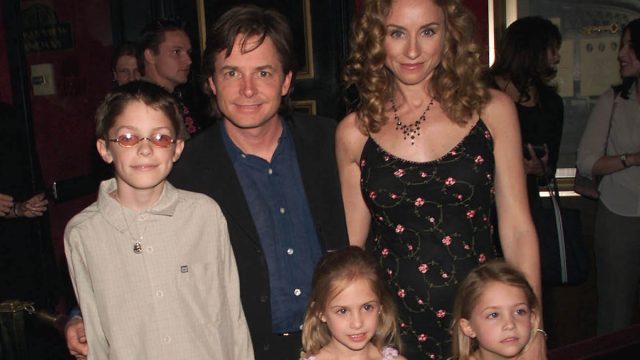 Actor Michael J. Fox arrives with his family, wife Tracy, son Sam, and twin daughters Schuyler and Aquinnah, at the New York premiere of the new Disney film 'Atlantis: The Lost Empire,' at the Ziegfeld Theater in New York City. June 6, 2001.