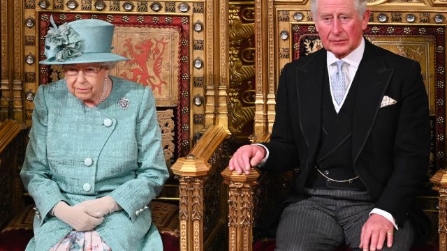 Queen Elizabeth II and Prince Charles, Prince of Wales attend the State Opening of Parliament in the House of Lord's Chamber on December 19, 2019 in London, England.