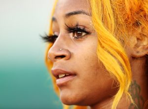 Sha'Carri Richardson looks on after winning the Women's 100 Meter final on day 2 of the 2020 U.S. Olympic Track & Field Team Trials at Hayward Field on June 19, 2021 in Eugene, Oregon.