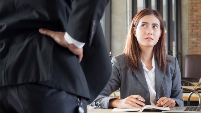 Boss talking down to employee