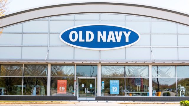 Bay Shore, New York, USA - 25 April 2020: The front of an Old Navy store in a strip mall empty due to the cdc rules during the coronavirus COVID-19 pandemic.