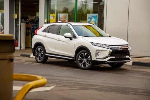 a white Mitsubishi Eclipse Cross car