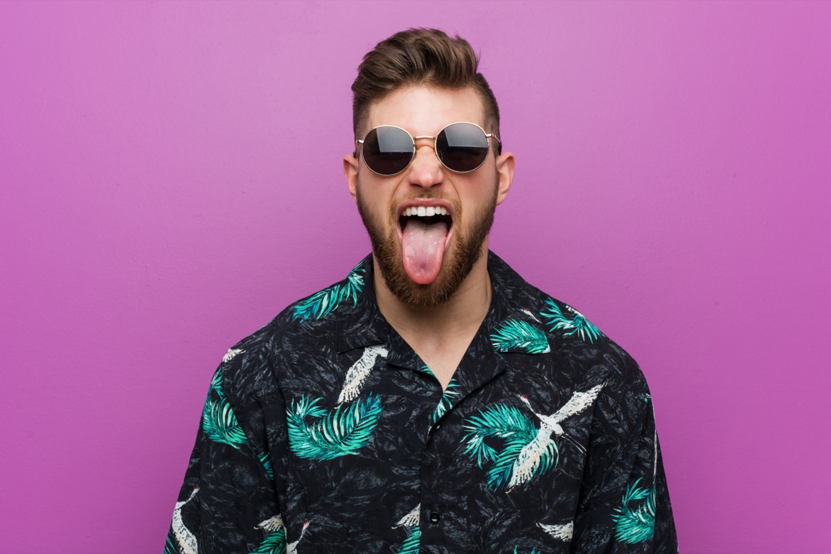 Man sticking out tongue