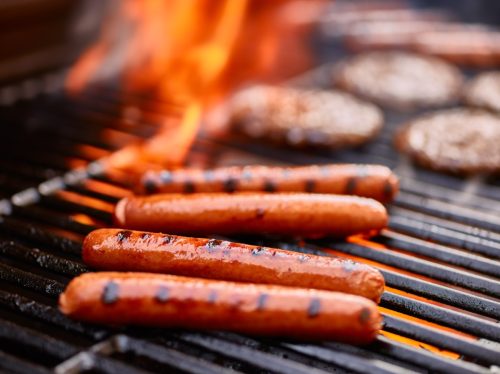 hot dogs on grill