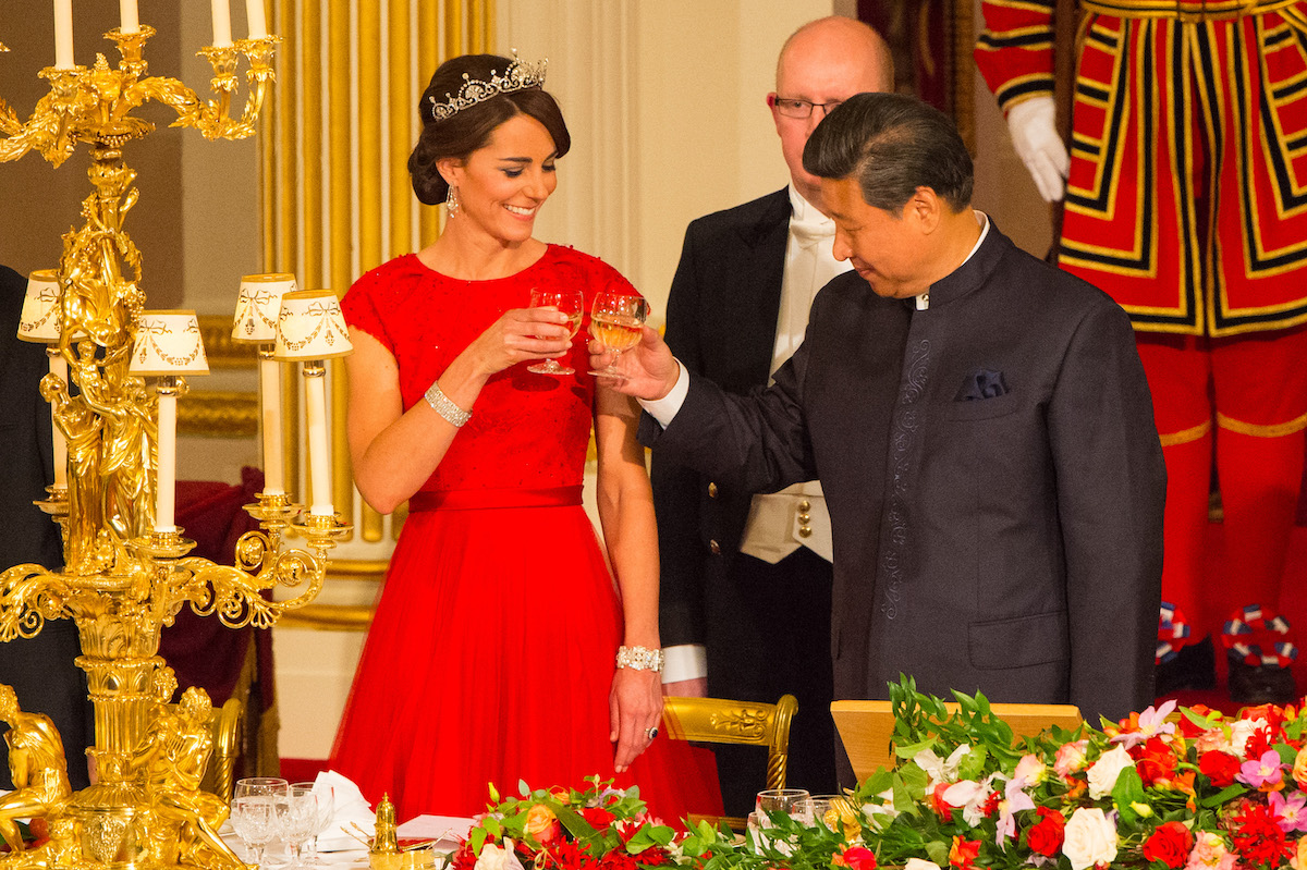 Chinese President Xi Jinping with the Duchess of Cambridge (left) and Queen Elizabeth II at a state banquet at Buckingham Palace, London, during the first day of his state visit to the UK.
