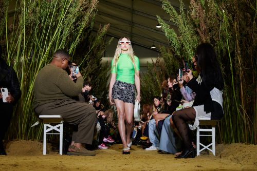 Eve Jobs modeling for Coperni at Paris Fashion Week on September 30, 2021