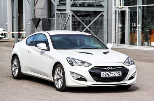 a white Hyundai Genesis car