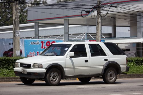 a white Isuzu Rodeo car