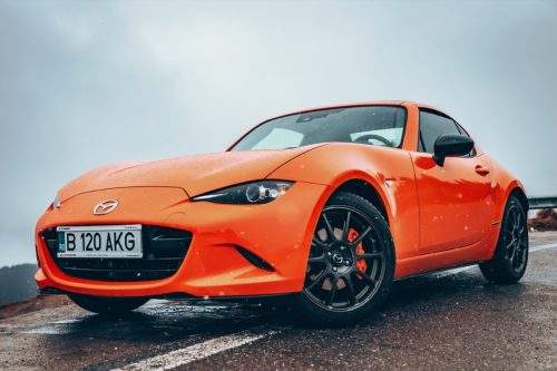 an orange Mazda MX 5 miata car
