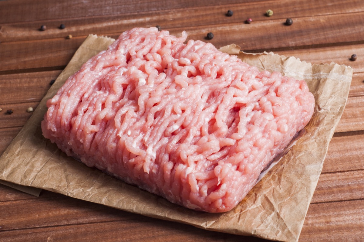 ground turkey on wooden cutting board