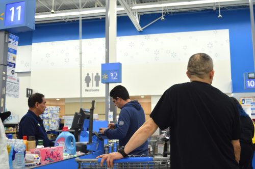 Columbus,Ohio/USA March 30,2019: Walmart is the largest consumer retail chain in the country. Consumers waiting in line to pay for their purchases.