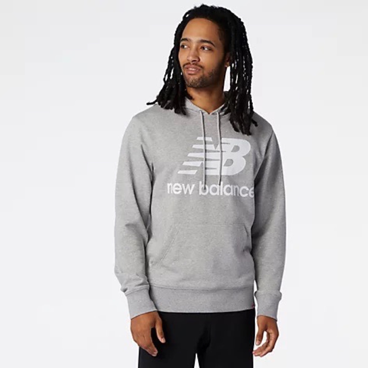 A man wearing a New Balance hoodie