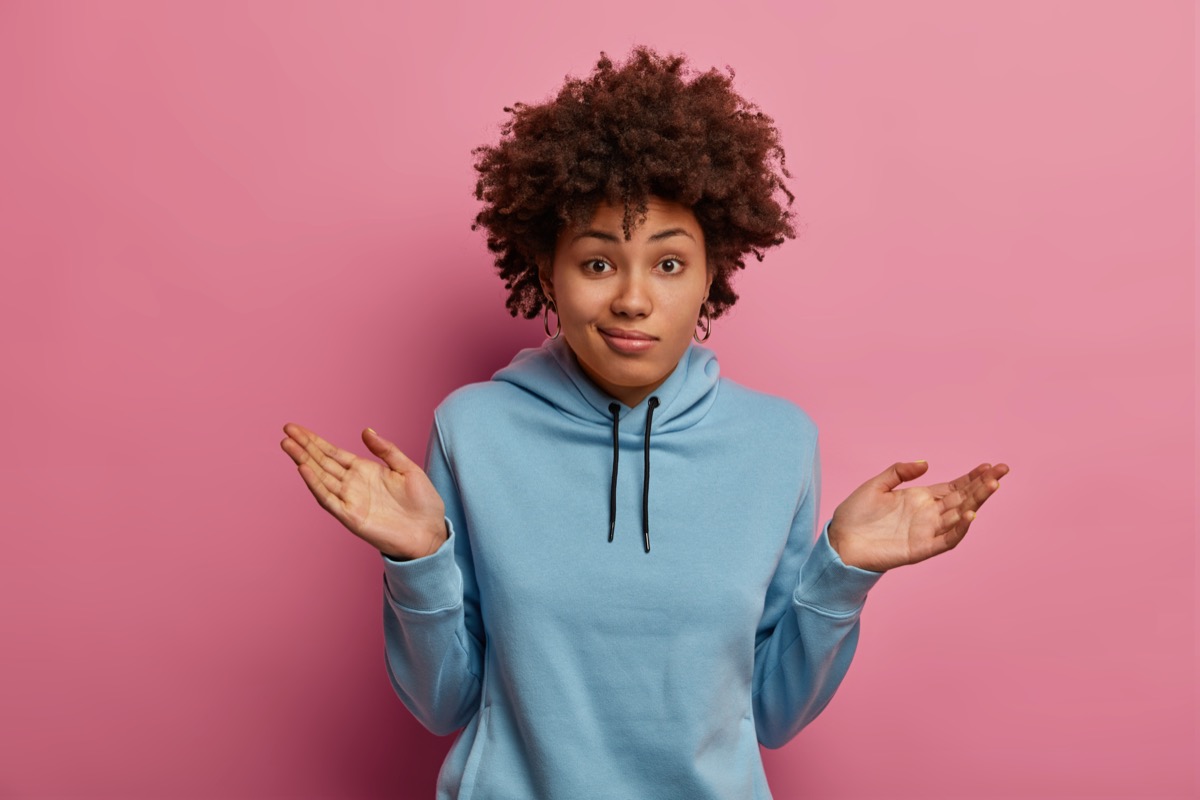 Woman shrugging