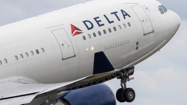 A Delta airlines plane taking off