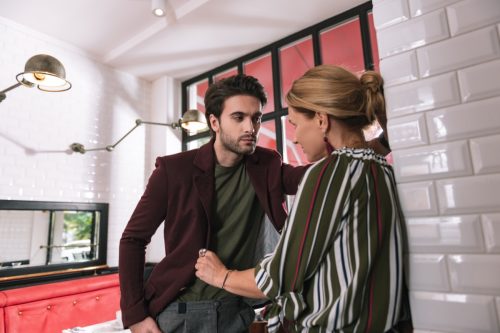 Man looking at woman in restaurant
