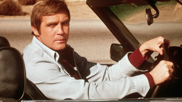 Lee Majors in a cart during a scene from "The Six Million Dollar Man" in 1975