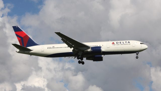 Delta Air Lines Boeing 767-300 with registration N153DL on short final for runway 04L of Copenhagen Airport, Kastrup.