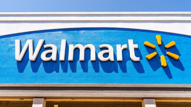 Close up of Walmart logo displayed on the facade of one of their supercenters in South San Francisco bay area