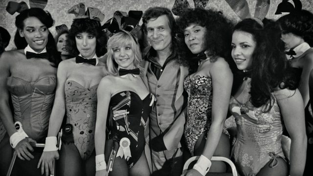 Hugh Hefner with Playboy Bunnies in 1981