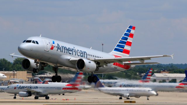 American Airlines Airbus A319 (Registration No. N723UW) taking off at Charlotte Douglas International Airport.