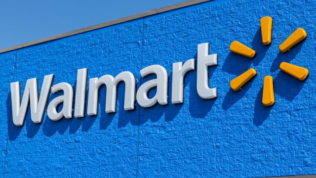 The exterior sign of a Walmart store