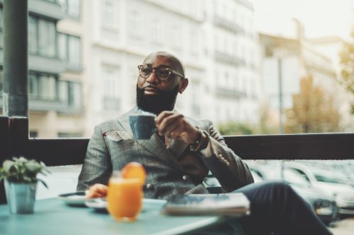 man sipping coffee