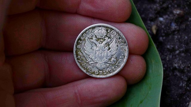 rare silver coin in hand