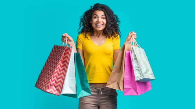 woman holding shopping bags