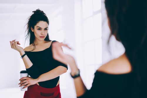 narcissistic girl staring at herself