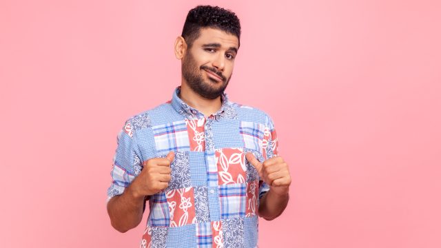 selfish man pointing to himself
