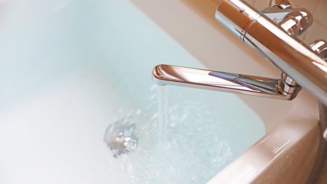 bathtub filling with water