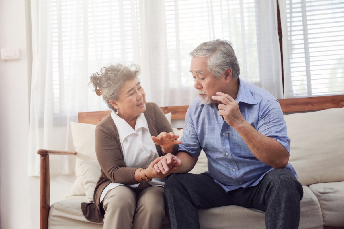 older couple sitting on couch