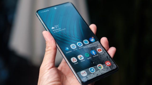 person holding Android smartphone