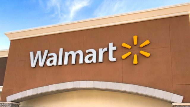 The exterior sign of a Walmart store