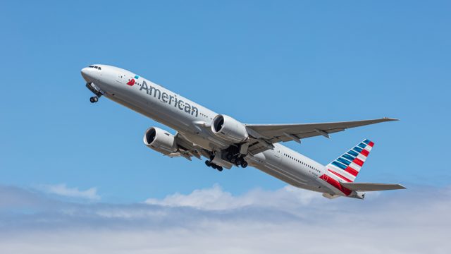 An American Airlines plane taking off into the sky