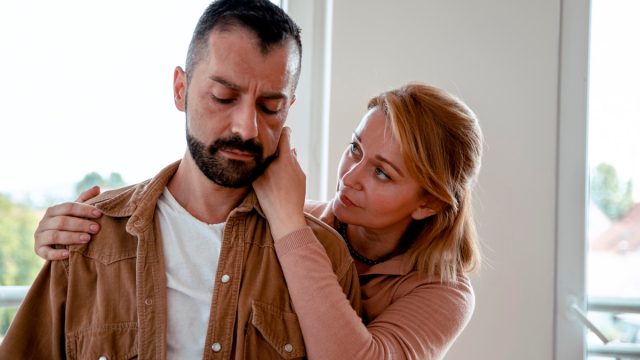 woman consoling man