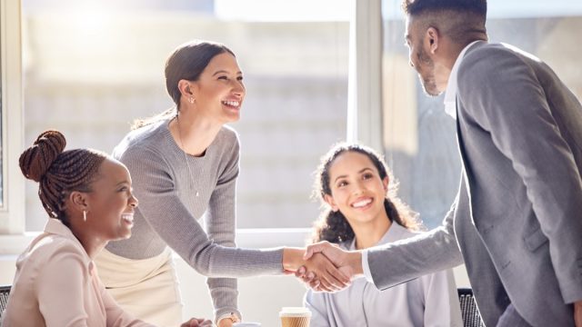 people shaking hands