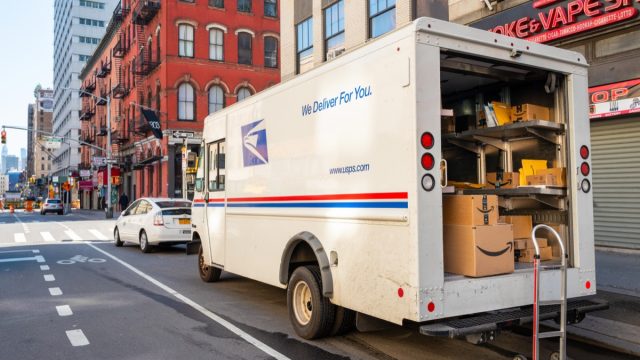 USPS truck delivering packages