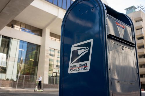 usps mailbox on the sidewalk
