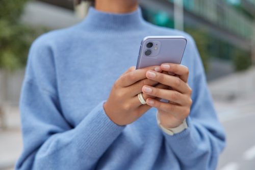 woman using phone outside