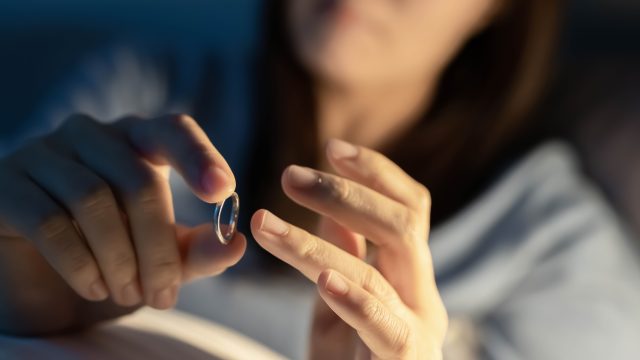 woman hold wedding ring