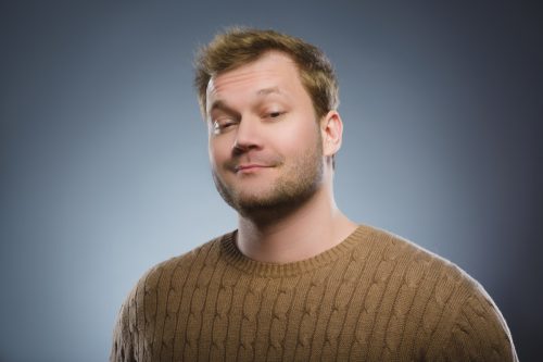 man looking smug and prideful