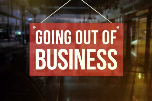 Going out of Business sign of a restaurant, cafe bar, or pub. Concept of indefinite closure, suspension, bankruptcy or going out of business.