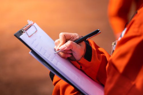 inspector with clipboard