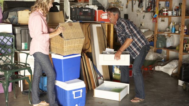 Couple,Clearing,Garage,For,Yard,Sale