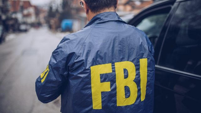 The back of an FBI agent